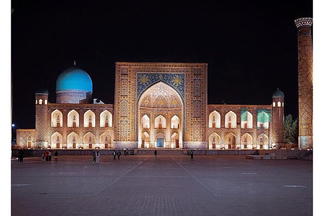 The Registan lit at dusk, Samarkand